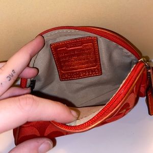 In good condition. Coach cosmetic bag.